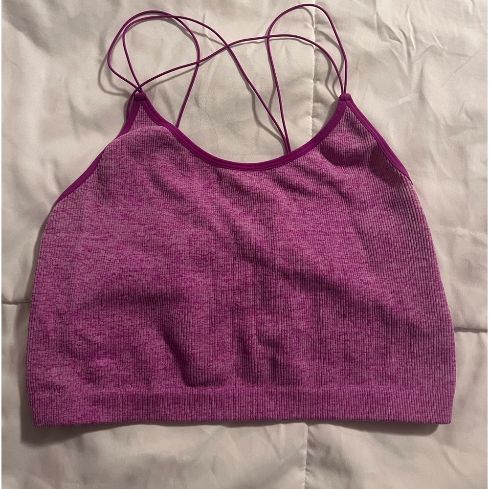 Pink and purple workout top.